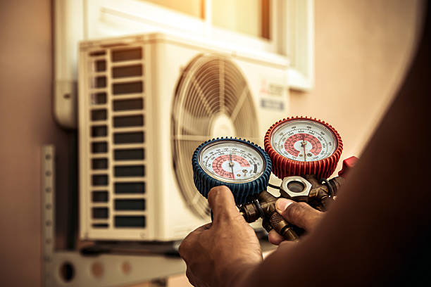 Professional Ac Installation technician working in Woodstock, MD